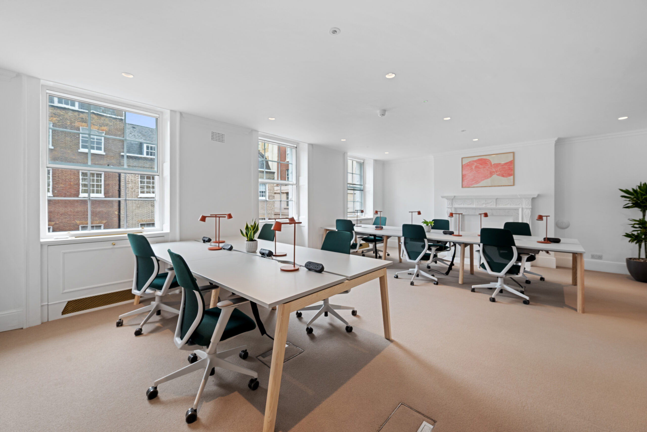 Elegant private office with abundant natural light and refined interiors.
