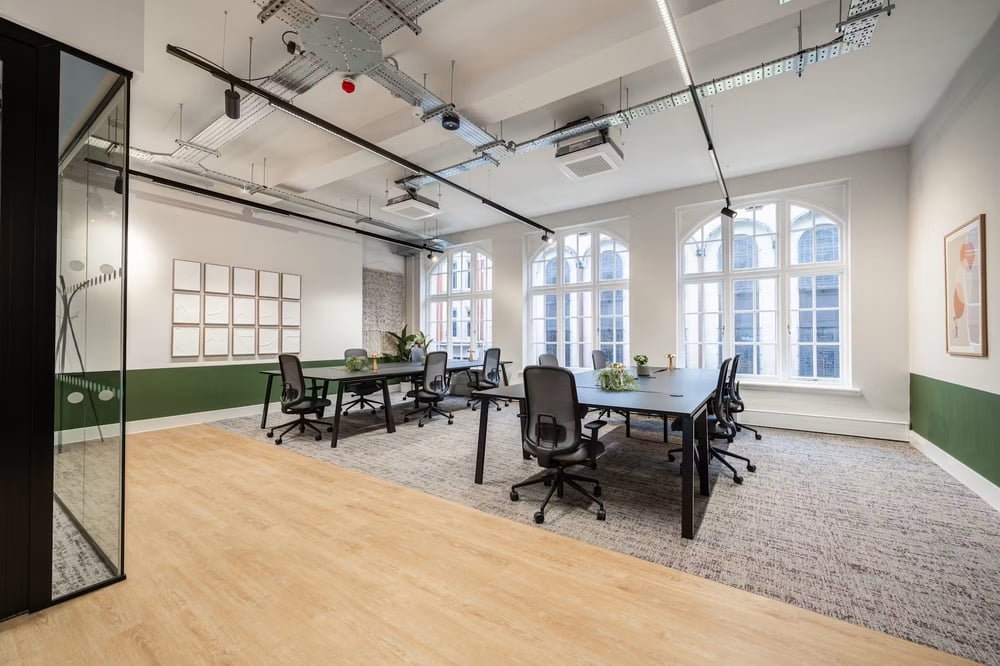Tall arched windows bring character and natural light to the furnished open-plan workspace at Prospect House.