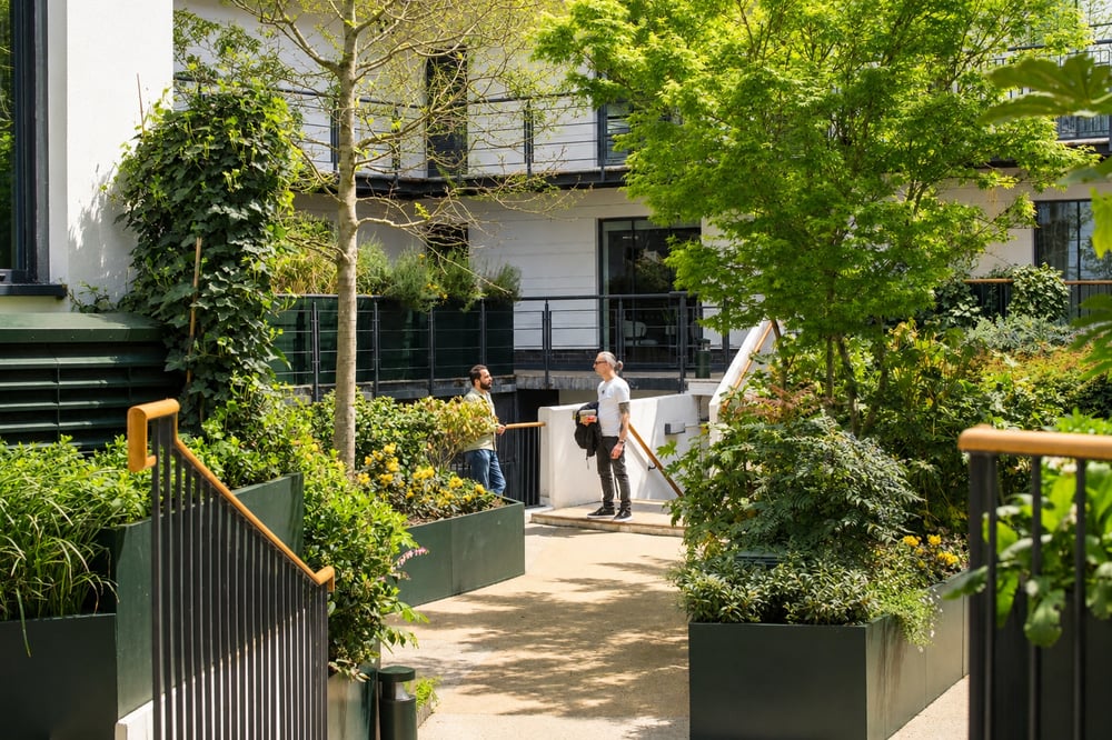 The central courtyard features extensive planting, secure bicycle storage facilities, and serves as an open air throughfare for the building.