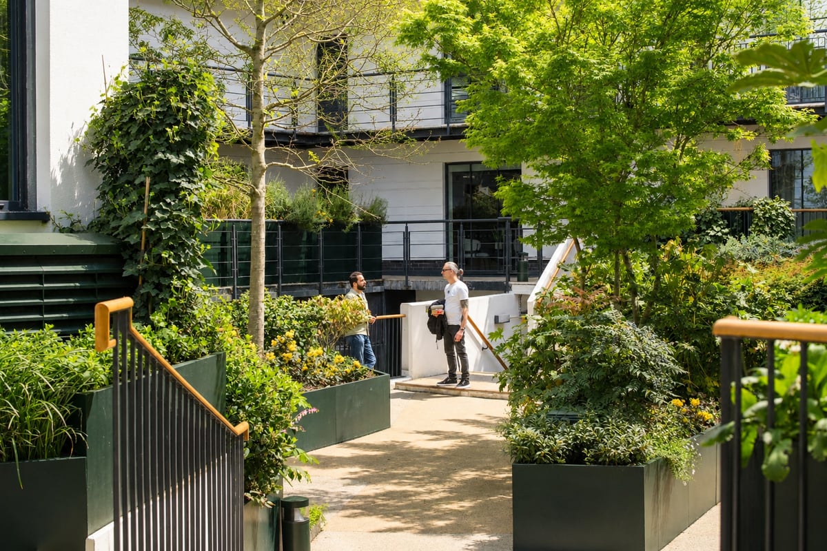 The central courtyard features extensive planting, secure bicycle storage facilities, and serves as an open air throughfare for the building.
