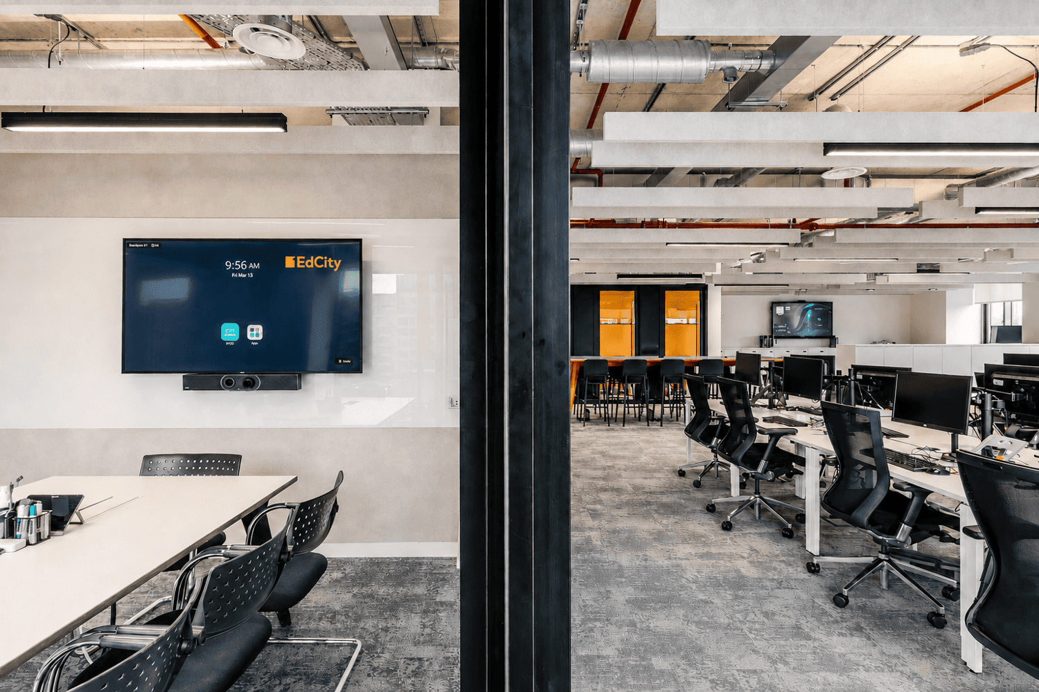 The floor is designed to blend open-plan communal working areas, with quieter meeting spaces and focus rooms.