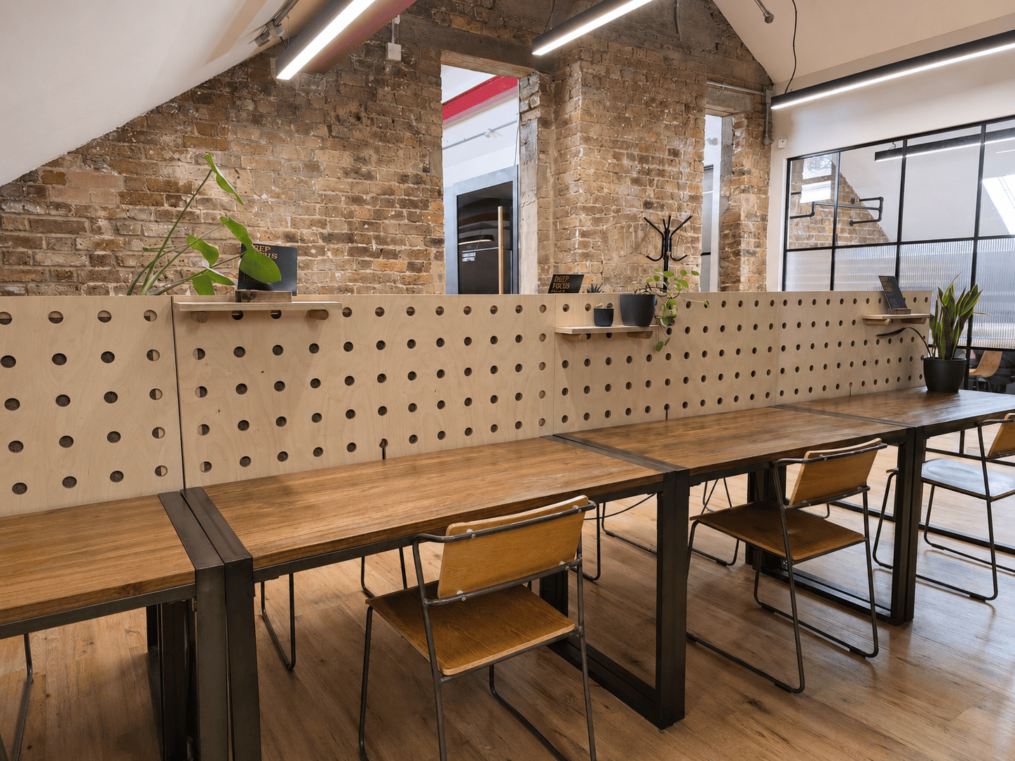 Lonsdale Club's Deep Focus Zone, complete with exposed brick and vaulted ceilings.