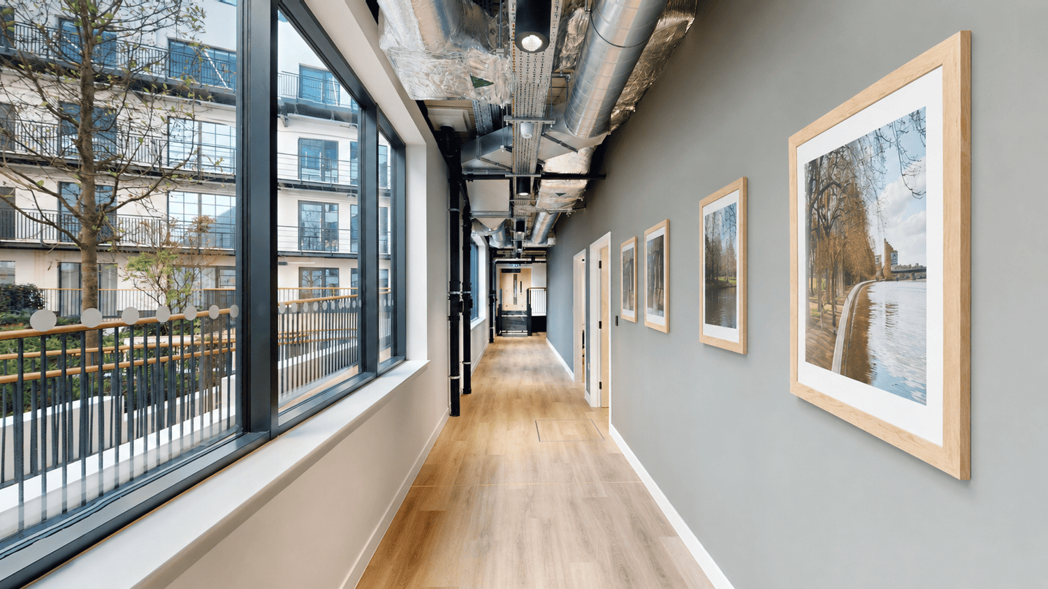 Private offices are connected via bright, glazed hallways which wrap around the central open courtyard.