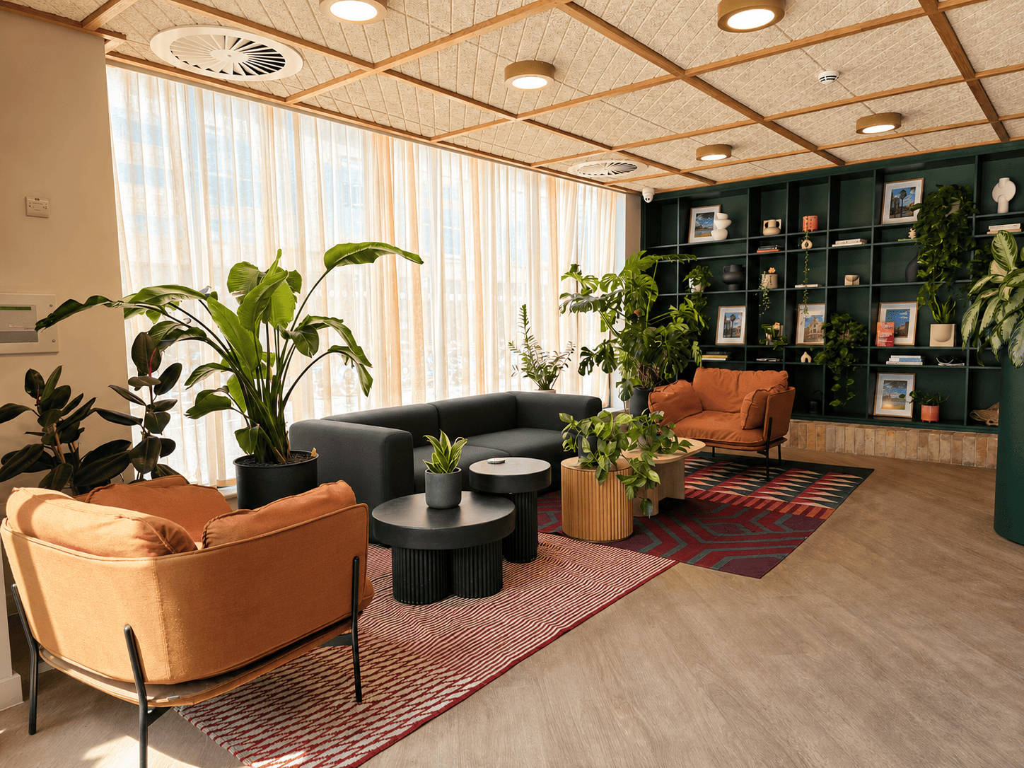 A stylish plant-filled reception greets you the second you step inside.