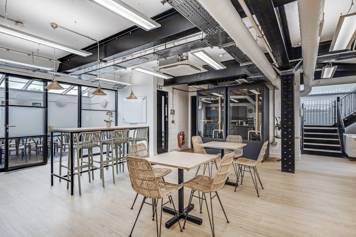 Industrial details balanced by natural materials throughout.