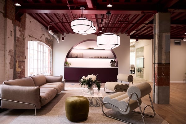 Private coffee station with adjoining breakout seating.