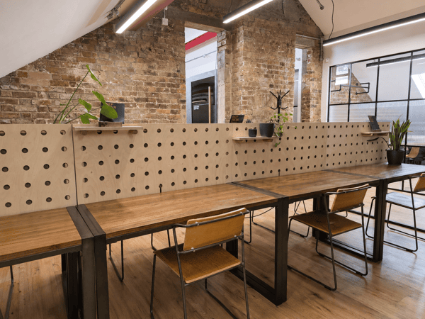 Lonsdale Club's Deep Focus Zone, complete with exposed brick and vaulted ceilings.