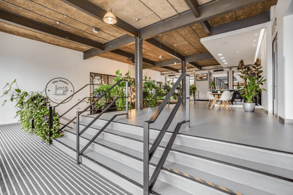 Extensive internal planting brings nature indoors throughout.